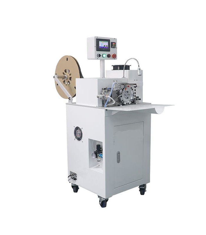 Automatic machine for inserting and heat shrinking sheaths